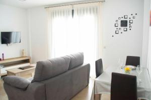Posedenie v ubytovaní Apartamentos EL POSAERO Juan Mariano