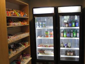 a refrigerator filled with lots of food and drinks at Best Western Eau Claire South in Eau Claire