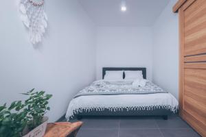 Tempat tidur dalam kamar di Harmony Place