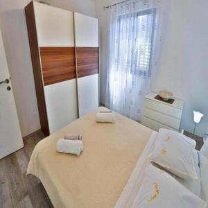 Lova arba lovos apgyvendinimo įstaigoje Apartments Lenka
