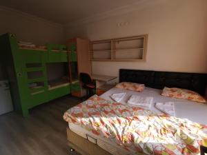 Postel nebo postele na pokoji v ubytování Çanakkale Kampüs Pansiyon