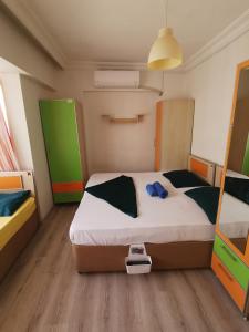 Postel nebo postele na pokoji v ubytování Çanakkale Kampüs Pansiyon