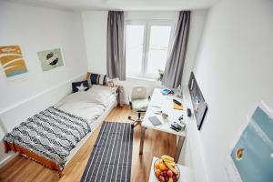 A bed or beds in a room at smartments Graz