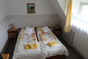 Posteľ alebo postele v izbe v ubytovaní Apartamenty "U Elżbiety"