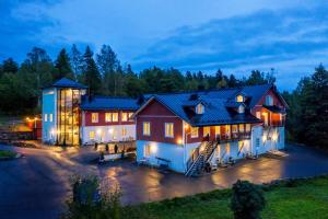 an image of a large house at night at Apartments in Porvoo in Porvoo