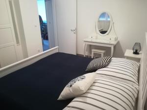 Łóżko lub łóżka w pokoju w obiekcie Apartment ANTONELLA