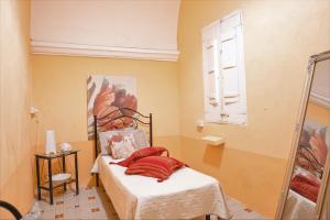 A bed or beds in a room at Casa Vacanza GICO'
