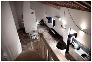 an overhead view of a room with a table and chairs at Almojanda 3 olive tree in Fortios