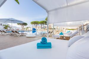 a villa with a pool and a resort at VIME La Reserva de Marbella in Marbella