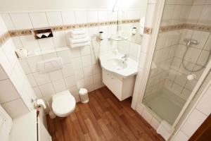 Koupelna v ubytování Hotel Jensen
