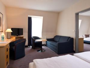 Voodi või voodid majutusasutuse ACHAT Hotel Dresden Elbufer toas