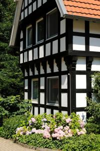Ein Garten an der Unterkunft VILA VITA Burghotel Dinklage