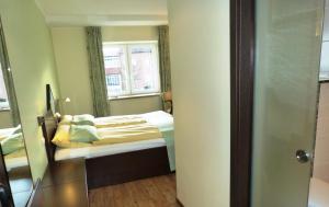 Postel nebo postele na pokoji v ubytování Hotel Evering