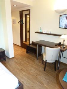 TV a/nebo společenská místnost v ubytování Hotel Evering