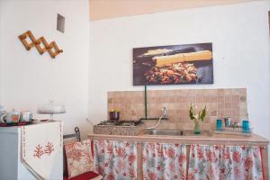 A kitchen or kitchenette at Casa Vacanza GICO'