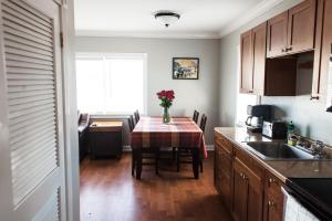 A kitchen or kitchenette at Riptide Oceanfront Hotel