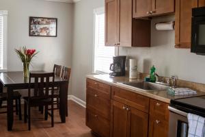 A kitchen or kitchenette at Riptide Oceanfront Hotel