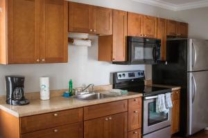 A kitchen or kitchenette at Riptide Oceanfront Hotel
