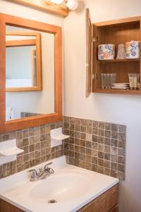 A bathroom at Riptide Oceanfront Hotel