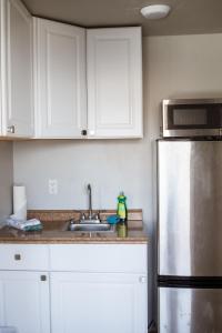 A kitchen or kitchenette at Riptide Oceanfront Hotel
