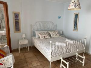 Postel nebo postele na pokoji v ubytování Bella Bari