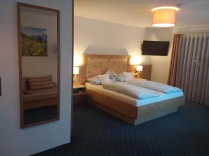 Postel nebo postele na pokoji v ubytování Landhaus Seehof