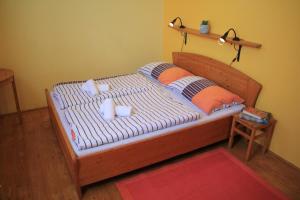 Un ou plusieurs lits dans un hébergement de l'établissement Outline Centrum Jiřičná