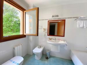 Kúpeľňa v ubytovaní Hotel EntreRobles