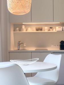 A kitchen or kitchenette at Appartements Gästehaus Gallob