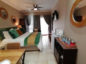Roxy's Rest Guest House客房内的一张或多张床位