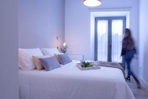 Cama o camas de una habitación en FerAla Suites Centro A
