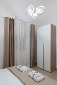 Postel nebo postele na pokoji v ubytování B.&.B Maison La Dama