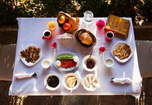 Opțiuni de mic dejun disponibile oaspeților de la Royal Hotel Voskopoja