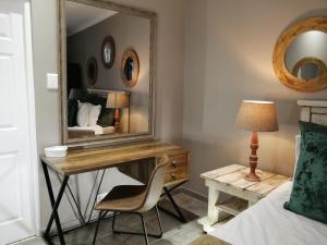 Roxy's Rest Guest House客房内的一张或多张床位