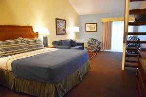 Ein Bett oder Betten in einem Zimmer der Unterkunft Surf Side Hotel