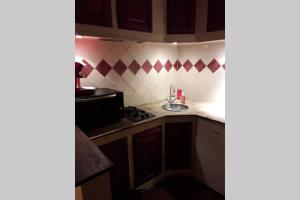 Cucina o angolo cottura di ARTEMIS GÎTE