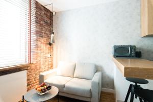 Televízia a/alebo spoločenská miestnosť v ubytovaní Apartament Solna - jedyny taki #Lublin + 5 fotografií