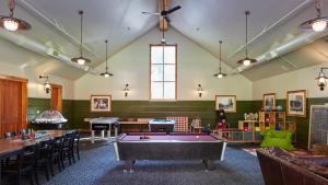 a billiard room with a pool table in it at Evergreen Lodge at Yosemite in Groveland