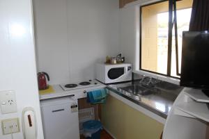 Kuchyň nebo kuchyňský kout v ubytování Taihape Motels