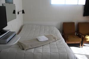 Postel nebo postele na pokoji v ubytování Taihape Motels