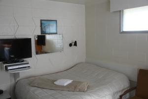 Postel nebo postele na pokoji v ubytování Taihape Motels