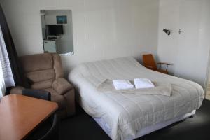 Postel nebo postele na pokoji v ubytování Taihape Motels