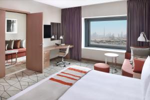 Postel nebo postele na pokoji v ubytování Holiday Inn & Suites - Dubai Festival City by IHG + 37 fotografií