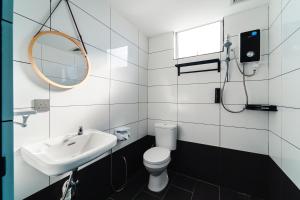 Vannituba majutusasutuses Perfect Hub Semporna