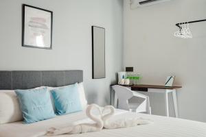 Voodi või voodid majutusasutuse Perfect Hub Semporna toas