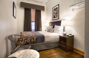 Кровать или кровати в номере Hotel 309