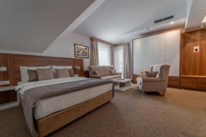 Postel nebo postele na pokoji v ubytování Hotel Mirjana & Rastoke