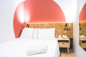 Postel nebo postele na pokoji v ubytování i-Hotel Kuala Lumpur