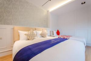 Voodi või voodid majutusasutuse Mucun Hot Spring Resort toas