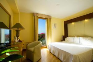 Postel nebo postele na pokoji v ubytování Uliveto Principessa Resort